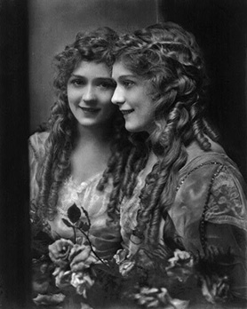 mary pickford 1893 half length facing left with mirror image facing slightly